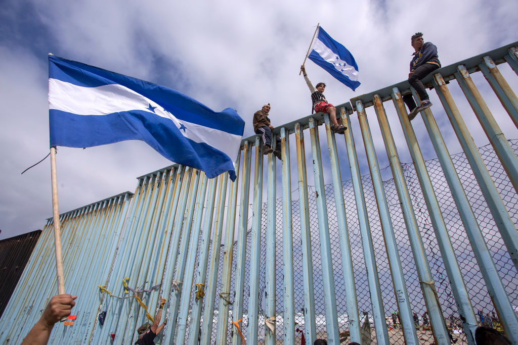 Migrants In Caravan That Travelled Through Mexico Attempt To Be Granted Asylum At U.S. Border