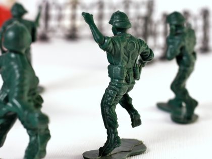 World War II toy soldier falling on battlefield