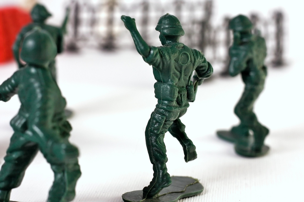World War II toy soldier falling on battlefield