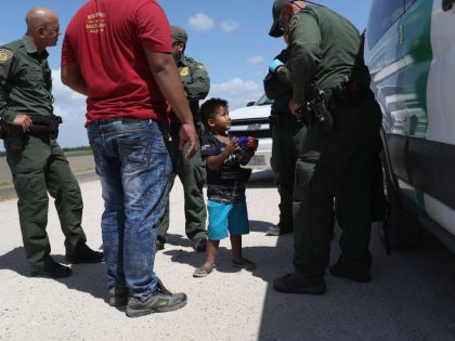Border Patrol Agents Detain Migrants Near US-Mexico Border