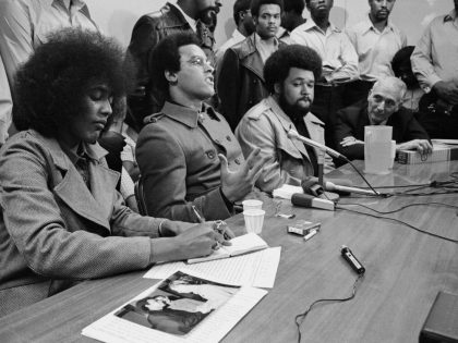 Huey P. Newton Holds Press Conference