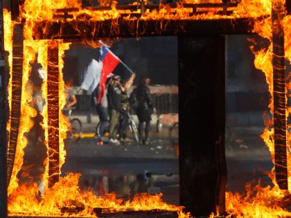 Protests Continue In Chile After President Piñera Declared State of Emergency And Suspended Subway Fare Hike
