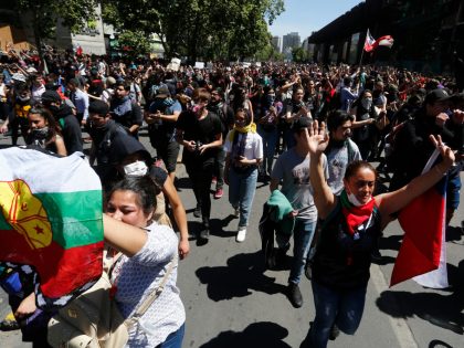 Protests Continue In Chile After President Piñera Declared State of Emergency And Suspended Subway Fare Hike