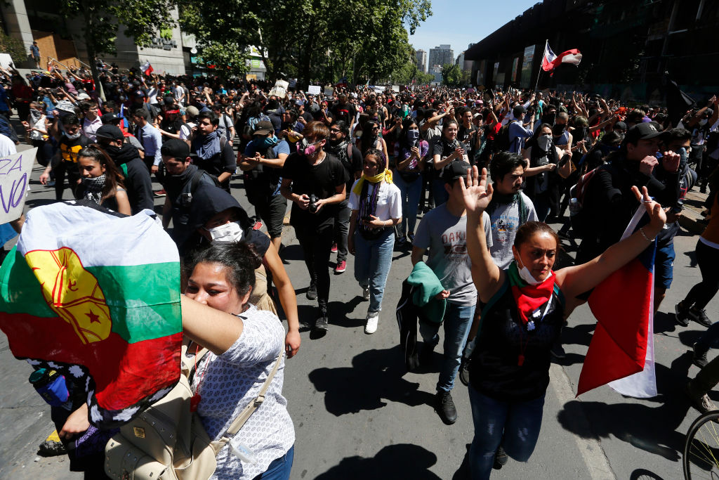 Protests Continue In Chile After President Piñera Declared State of Emergency And Suspended Subway Fare Hike