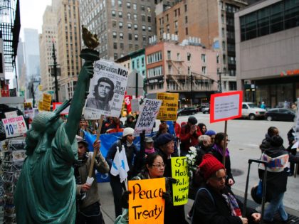 Anti-War Protests Take Place Across Country After President Trump Ordered Airstrikes In Syria