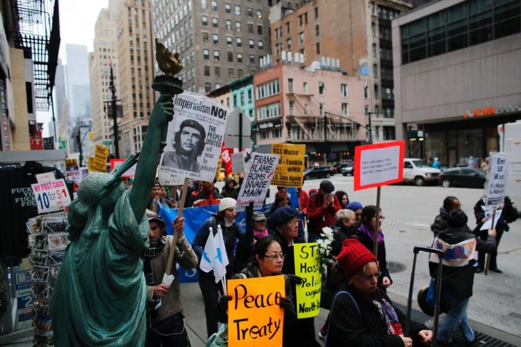Anti-War Protests Take Place Across Country After President Trump Ordered Airstrikes In Syria