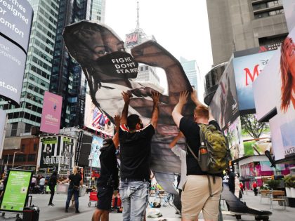Activists Rally In NYC's Times Square For Fair Wage For Tipped Workers