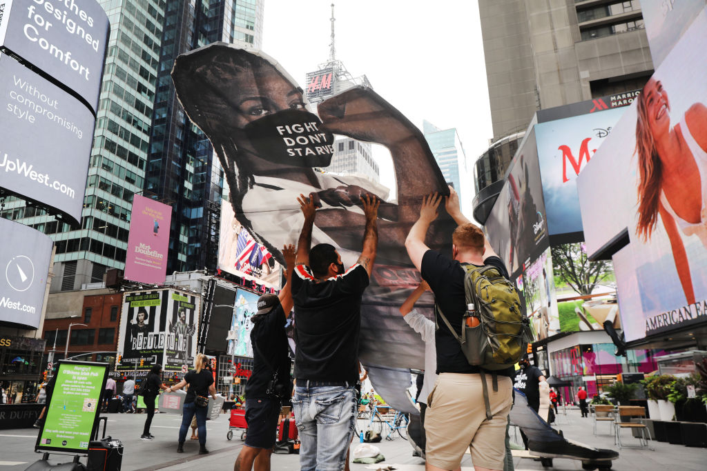Activists Rally In NYC's Times Square For Fair Wage For Tipped Workers