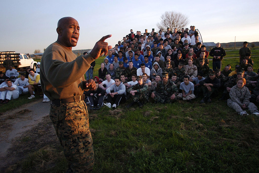 High School Students Undertake Marine Corps Obstacle Course Challenge