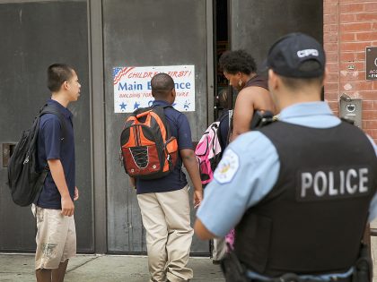 Chicago Police And Neighborhood Officials Escort Children To School