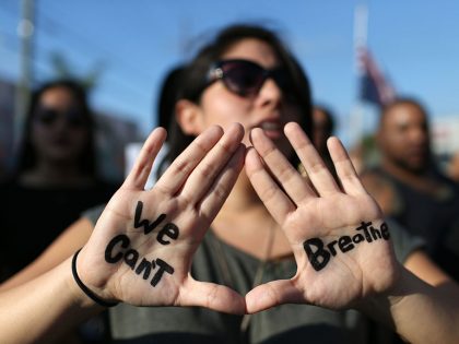 Protesters In Miami Hold A "Hands Up Don't Shoot" Demonstration In Wake Of Recent Grand Jury Verdicts