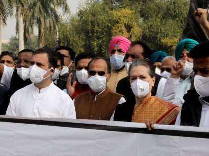 Leaders of opposition parties wearing face masks hold a