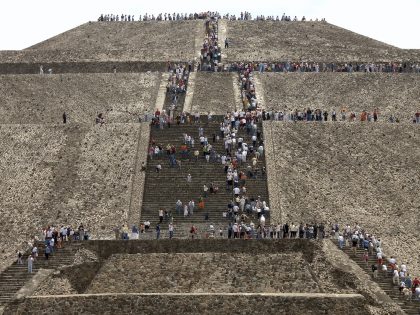 Mexico, Mexico City, people on steps of Teotihuacan pyramids
