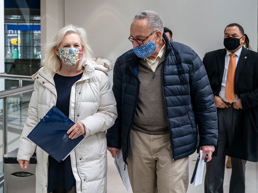 U. S. Senators Kirsten Gillibrand and Chuck Schumer wearing