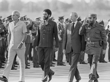 Fidel Castro Saluting with Foreign Officials