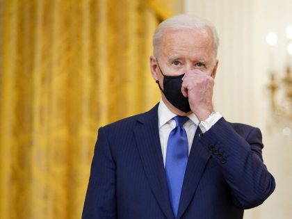 US-POLITICS-BIDEN-WOMENS DAY