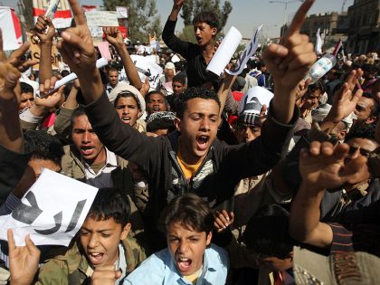 Yemeni anti-government protesters chant