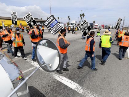 Teamster walk a picket line in San Pedro, disrupting traffic at one terminal.