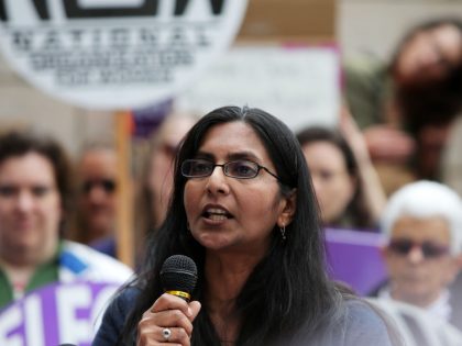 Seattle city councilmember Kshama Sawant speaks to everal hundred people gathered outside of City Hall, Tuesday, as part of a national day of action protesting the strict abortion laws that have been making their way through the legislatures of various st