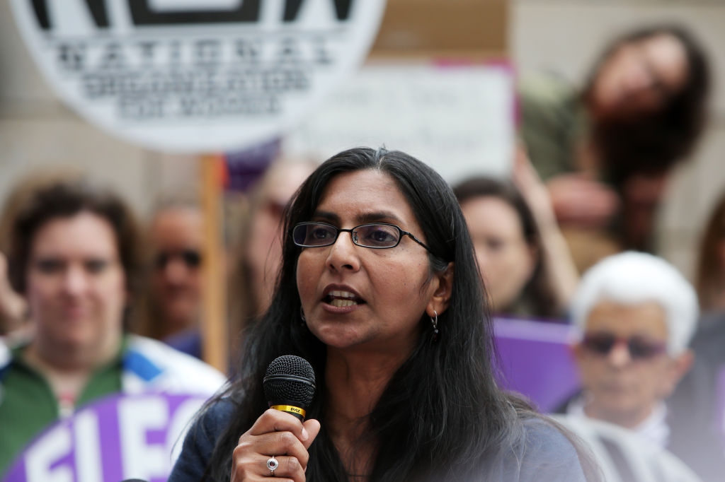Seattle city councilmember Kshama Sawant speaks to everal hundred people gathered outside of City Hall, Tuesday, as part of a national day of action protesting the strict abortion laws that have been making their way through the legislatures of various st