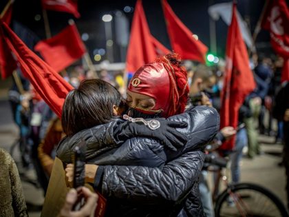 People hugging during the celebrations.
After two days of