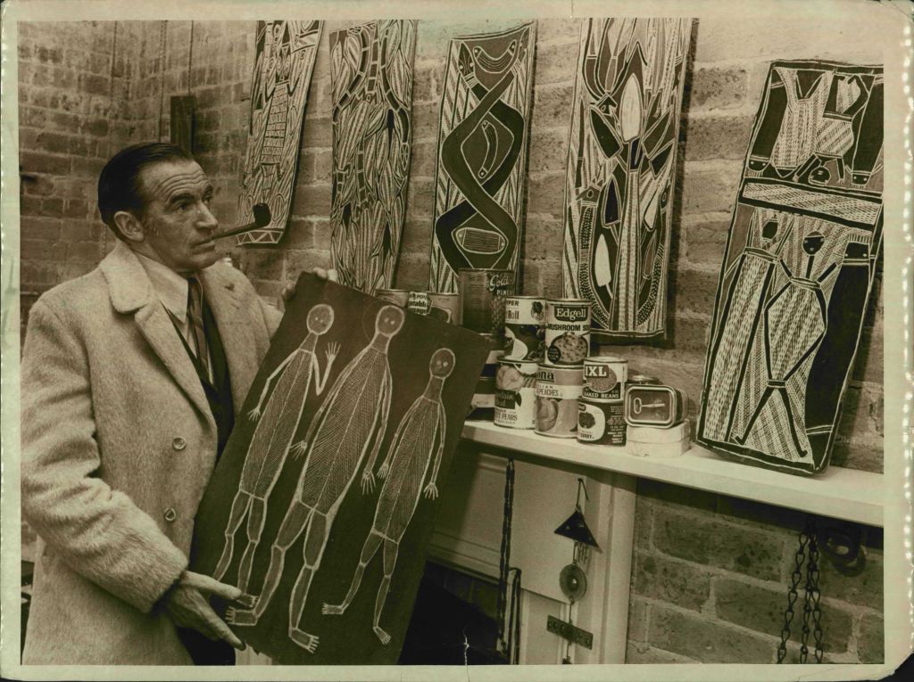 Well known author and authority on Aboriginal art, Frank Hardy shows a critical eye on some of the bark paintings which are on exhibition at the Rocks Gallery. Admission fee to the galls gallery was by canned food which will be sent to the Gurindji tribe.