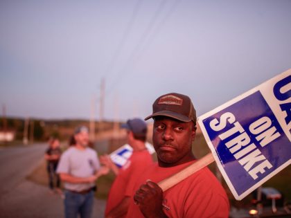 Workers from United Auto Workers Local 440 picket outside