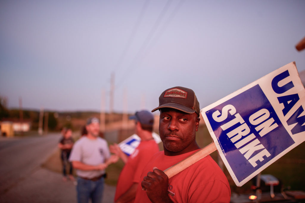 Workers from United Auto Workers Local 440 picket outside