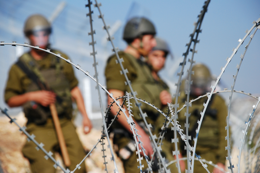 Razor Wire and Soldiers