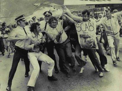 Builders Labourers demonstrate for Rocks' green ban.Pic Shows: Police scuffle Labourers on march from West circular Quay to state office block.**** Scuffle with demonstrators carrying a banner during Yesterday's Labourers Federation march.