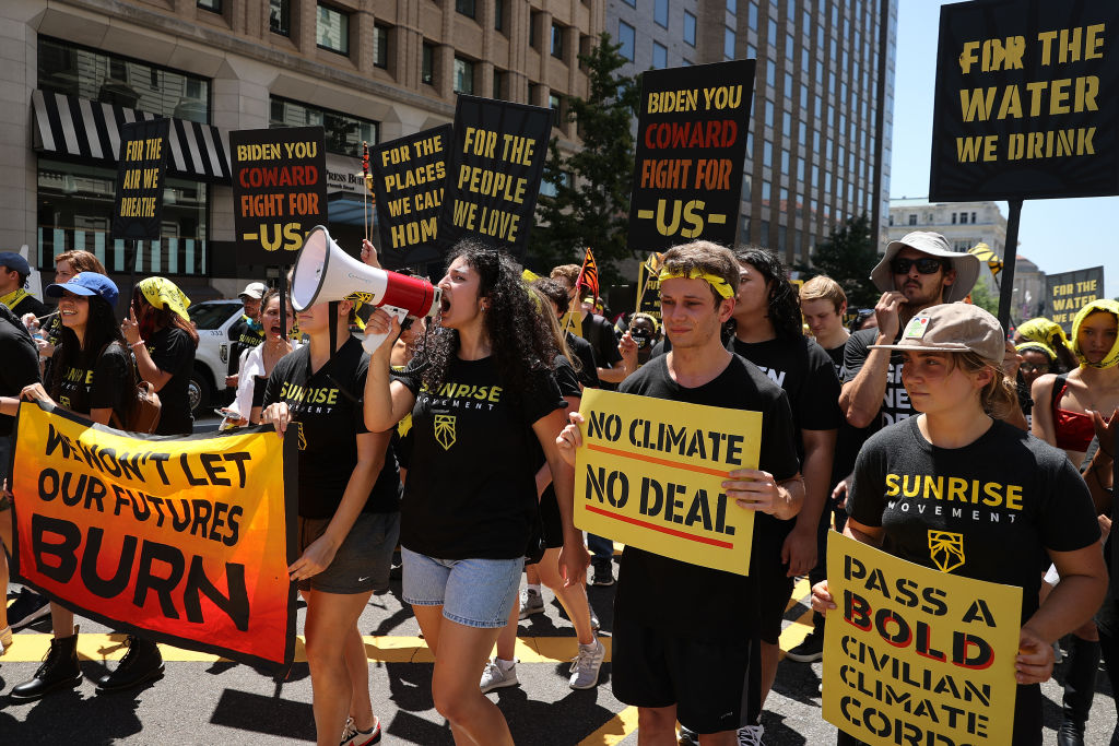 Climate Activists Protest Infrastructure Deal In Washington, DC