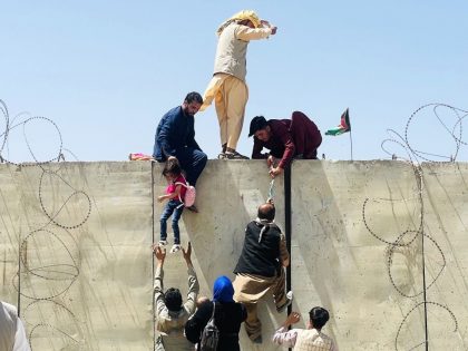 Thousands of Afghans rush to the airport in Kabul