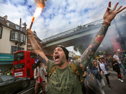 A protester holding a burning flare, during the medical