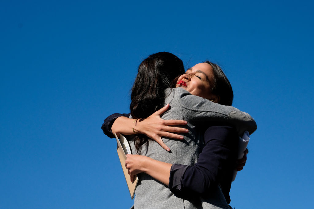 Alexandria Ocasio Cortez embraces Tiffany Caban at Bernie