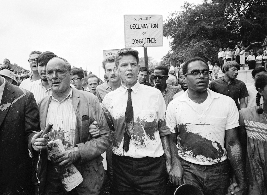 Vietnam Protesters Splashed in Red Paint