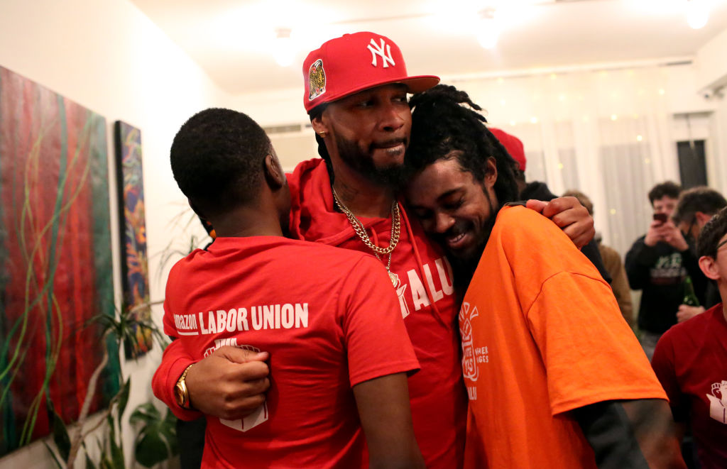 BROOKLYN, NY - APRIL 01: (L-R) Jean-Michel Mutore, a former Ama