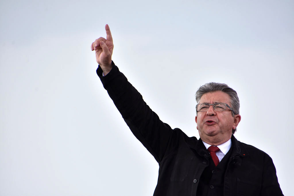 Jean-Luc Melenchon on stage during his political meeting