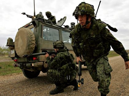 AFGHANISTAN EXERCISES.05.10.2007.Members of the Defense and Security team fire on enemy 'insurgents'