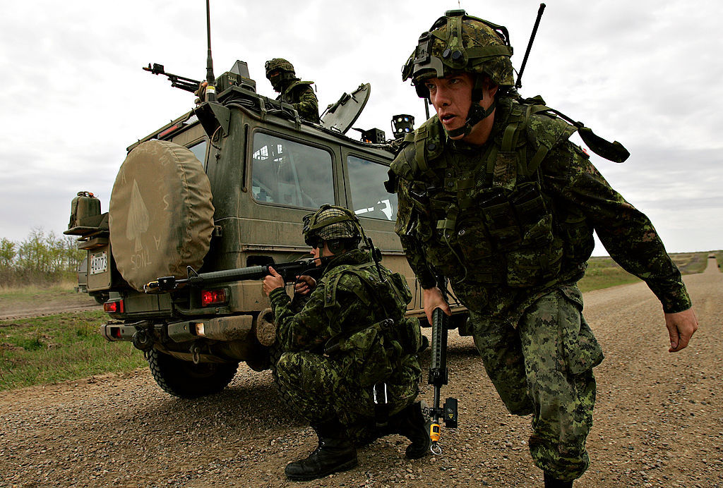 AFGHANISTAN EXERCISES.05.10.2007.Members of the Defense and Security team fire on enemy 'insurgents'