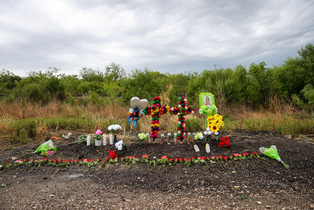 A vigil held after migrants found dead in Texas trailer truck