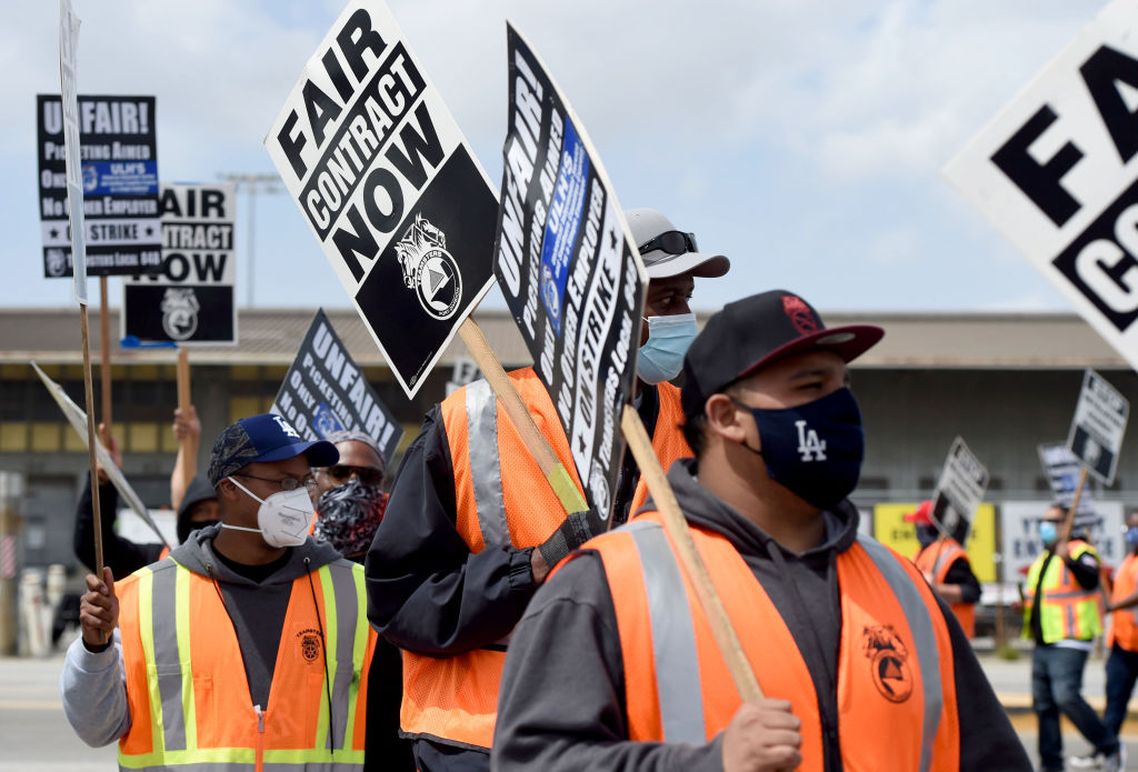 Teamster walk a picket line in San Pedro, disrupting traffic at one terminal.