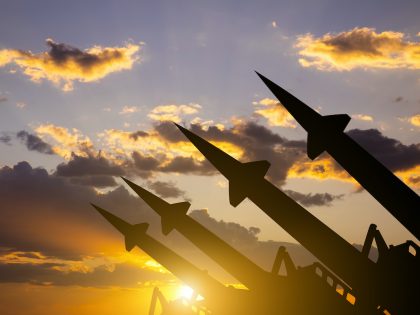 Anti-aircraft missile system on the background of sunset sky