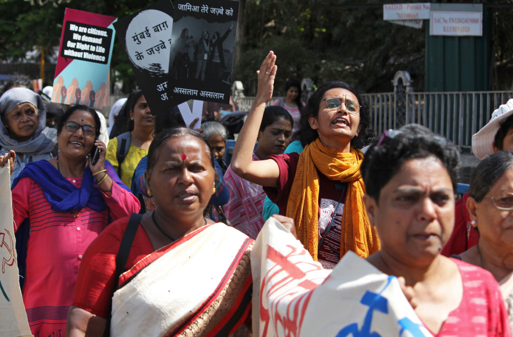 A woman shouts slogans during the demonstration.
Women from