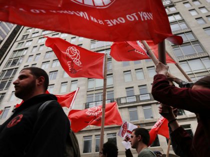 Activists March To Trump Tower On International Workers' Day Calling For Immigrants' Rights