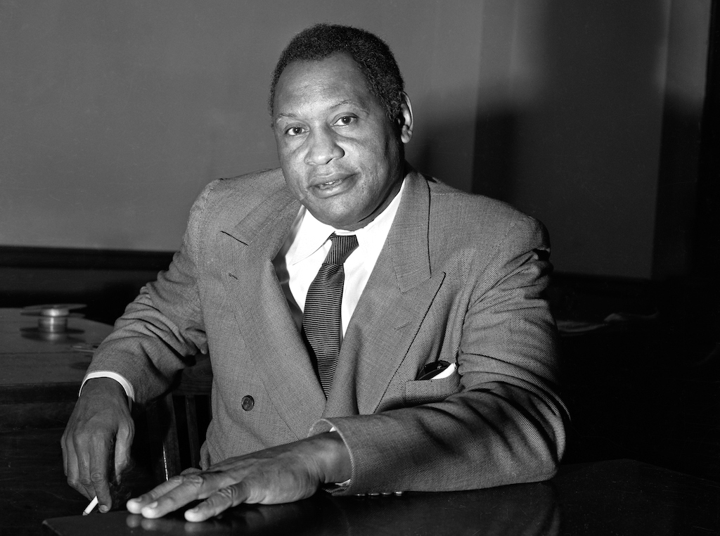 Paul Robeson Gesturing While Speaking to Press