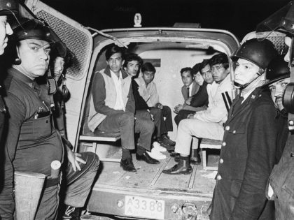 Captured Student Rioters In Police Van