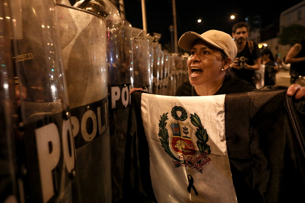 Demonstrators march in Lima