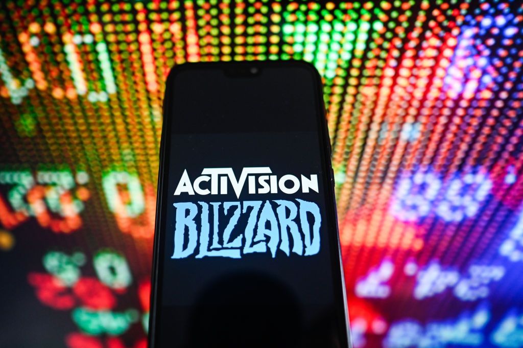In this photo illustration an Activision Blizzard logo is