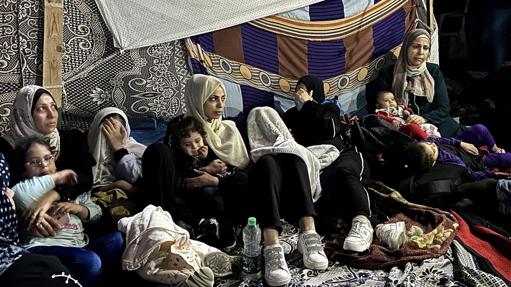 Families fleeing their homes in Gaza seek refuge in Al-Shifa Hospital