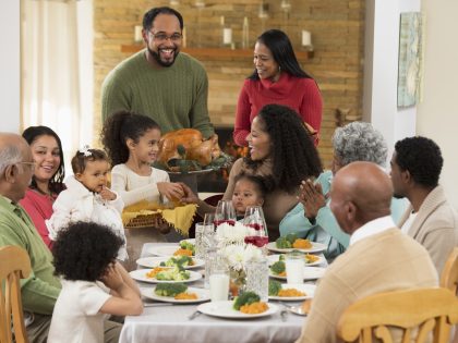 Family eating Thanksgiving dinner
